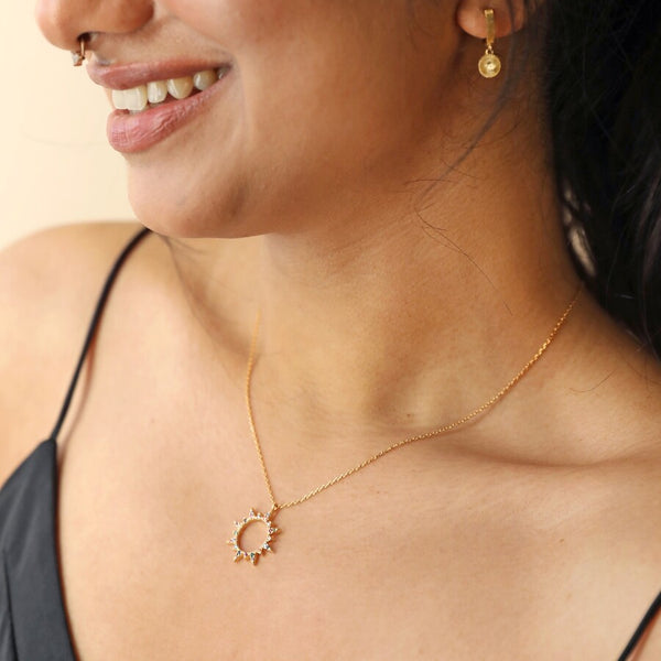 Rainbow Crystal Sunburst Pendant Necklace in Gold