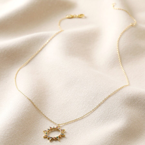 Rainbow Crystal Sunburst Pendant Necklace in Gold
