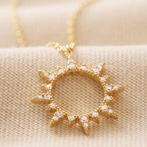 Crystal Sunburst Pendant Necklace in Gold